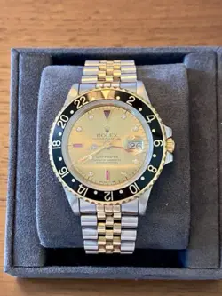 Rolex GMT-Master II Champagne Serti Dial 14k Gold/Steel with Diamonds and Rubies
