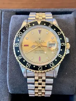 Rolex GMT-Master II Champagne Serti Dial 14k Gold/Steel with Diamonds and Rubies