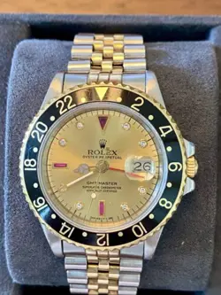 Rolex GMT-Master II Champagne Serti Dial 14k Gold/Steel with Diamonds and Rubies
