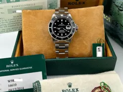 ROLEX SUBMARINER DATE 16610 BLACK DIAL STAINLESS STEEL BOX PAPER