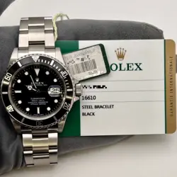 2015 ROLEX SUBMARINER DATE 16610, 40MM, STEEL, BLACK DIAL, BOX & PAPERS