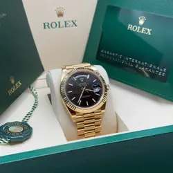 Rolex Day-Date 40 NEW 2025 Black Dial 18k Yellow Gold Fluted Bezel President