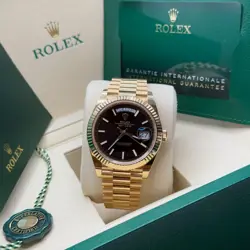 Rolex Day-Date 40 NEW 2025 Black Dial 18k Yellow Gold Fluted Bezel President
