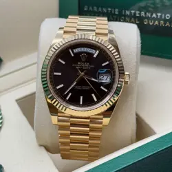 Rolex Day-Date 40 NEW 2025 Black Dial 18k Yellow Gold Fluted Bezel President
