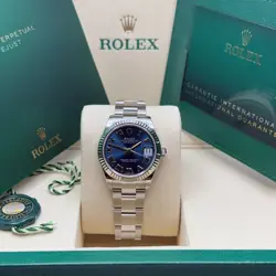 ROLEX DATEJUST 31 NEW 2025 BLUE ROMAN DIAL STAINLESS STEEL FLUTED JUBILEE