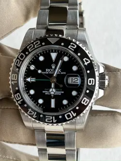 ROLEX GMT-MASTER II 116710LN SILVER OYSTER BRACELET WITH BLACK DIAL AND BEZEL