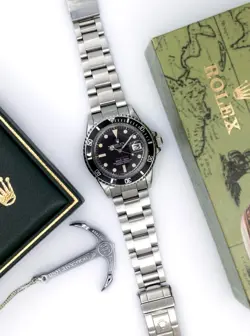 1972 ROLEX ‘RED’ SUBMARINER 1680 MATT BLACK PERFECT DIAL VANILLA PATINA 40MM