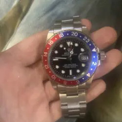 ROLEX GMT-MASTER 16700 SILVER OYSTER BRACELET WITH BLUE AND RED BEZEL