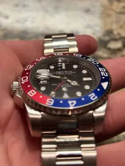 Rolex GMT-Master 16700 Silver Oyster Bracelet with Blue and Red Bezel