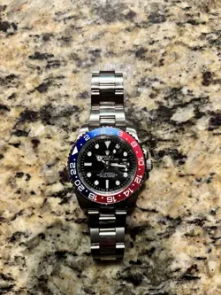 Rolex GMT-Master 16700 Silver Oyster Bracelet with Blue and Red Bezel
