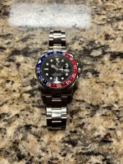 Rolex GMT-Master 16700 Silver Oyster Bracelet with Blue and Red Bezel