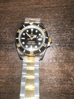 ORIGINAL NEW ROLEX SUBMARINER SILVER AND GOLD OYSTER BRACELET WITH BLACK BEZEL