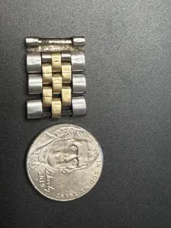 3 LINKS FROM A ROLEX WATCH