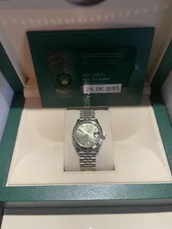 ROLEX LADIES DATEJUST S/G 31MM ROMAN NUMERALS DIAMONDS AT 6 OCLOCK. NIB