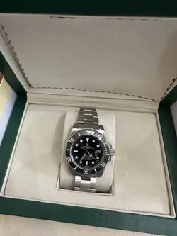ROLEX SUBMARINER SILVER OYSTER WATCH WITH BLACK BEZEL  41MM