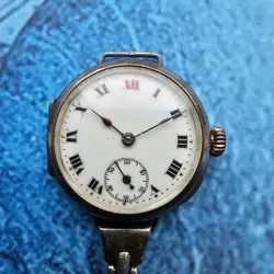 ROLEX SILVER TRENCH