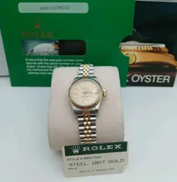 LADIES WATCH W/PAPERS