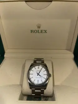 ROLEX OYSTER PERPETUAL 114200 SILVER OYSTER BRACELET WITH SILVER BEZEL