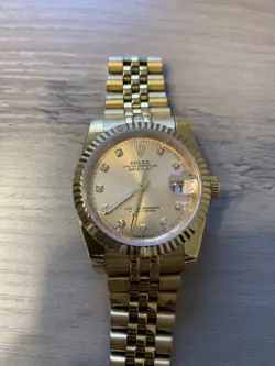WOMENS GOLD ROLEX WATCH