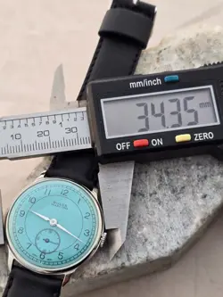 ROLEX MARCONI   A CUERDA DE HOMBRE DIAL RESTAURADO COLOR TURQUESA CAJA NIQUEL