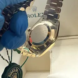 ROLEX PRESIDENT DAY DATE 228238 40MM BLACK BAGUETTE DIAMOND 18K GOLD W/ STICKERS