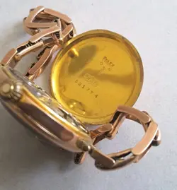 W.