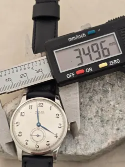 ROLEX MARCONI  A CUERDA DE HOMBRE DIAL RESTAURADO COLOR PLATA CAJA  NICKEL