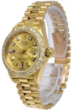 LADIES 18K GOLD ROLEX WITH DIAMOND BEZEL WATCH