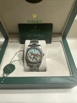 ROLEX OYSTER PERPETUAL 36MM TURQUOISE CELEBRATION DIAL 126000 BOX