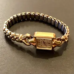 18K GOLD SWISS