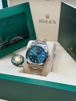 Milgauss NEW Discontinued Blue Dial Green Crystal Stainless Steel