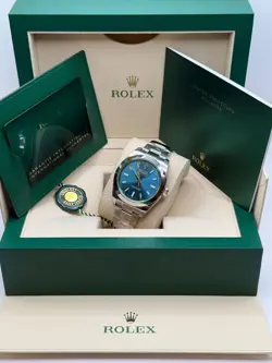 Milgauss NEW Discontinued Blue Dial Green Crystal Stainless Steel