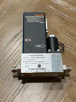 BROOKS 5850E MASS FLOW CONTROLLER MFC - GAS: HELIUM - FLOW: 0.02 LB/DAY
