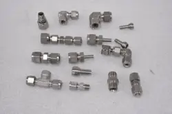 MISCELLANEOUS SILVER SWAGELOK HYDRAULIC FITTINGS AND ADAPTERS (LOT OF 15)