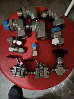 LOT OF 12 SWAGELOK STAINLESS FITTINGS AND VALUES