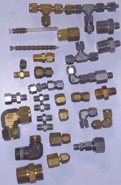 USED MIXED LOT OF SWAGELOK BRASS & STAINLESS STEEL FITTINGS NO FERRELS FEW NUTS