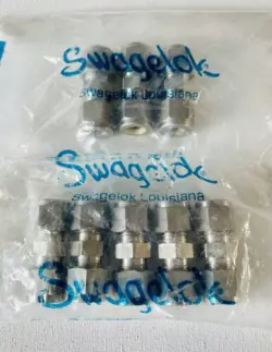 LOT OF 8 NEW SWAGELOK SS-600-6 3/8