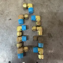 (9) SWAGELOK 90 DEGREE 3/8” TUBE TO 3/8 NPT COMPRESSION FITTING
