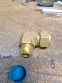 9 - SWAGELOK BRASS ELBOW FITTING,  1