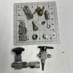 LOT OF SWAGELOK PARTS AND WHITEY VALVES.