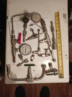 VALVES FITTINGS AND