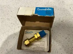 (1) SWAGELOK B-600-11-4 BRASS TUBE BULKHEAD FITTING NEW