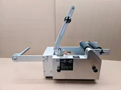 ROUND LABELING MACHINE