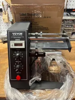 LABEL DISPENSER MODEL: