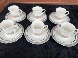 CUPS SAUCERS AND