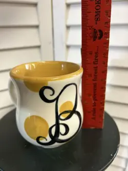 TALL INITIAL
