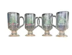 NIKKO HAPPY HOLIDAYS/ CHRISTMAS CLEAR FOOTED GLASS WARE VINTAGE MUGS SET OF 4