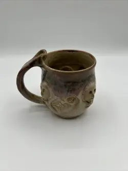 MUG THUMB REST