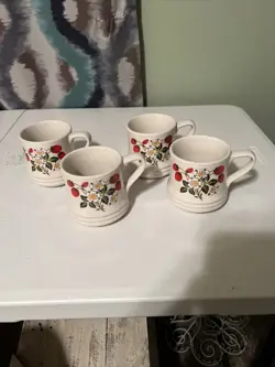 CREAM STONEWARE MUGS