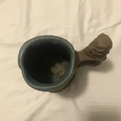 MAIDEN INSIDE POTTERY